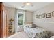 Cozy bedroom with a single bed, a window with natural light, and charming decor at 2173 Beacon Crest Dr, Buford, GA 30519
