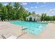 Exterior shot of a community pool with lounge chairs at 2173 Beacon Crest Dr, Buford, GA 30519