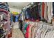 Spacious walk-in closet with organized shelving and ample storage for clothing and accessories at 2173 Beacon Crest Dr, Buford, GA 30519