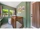 Bright Bedroom featuring a crib, comfortable chair, and natural light at 220 Sisson Ne Ave, Atlanta, GA 30317