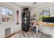 Laundry room with stacked washer and dryer plus a work area for convenience at 220 Sisson Ne Ave, Atlanta, GA 30317