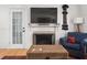Comfortable living room featuring a fireplace at 220 Sisson Ne Ave, Atlanta, GA 30317