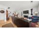Open concept living room featuring a fireplace and hardwood floors at 220 Sisson Ne Ave, Atlanta, GA 30317