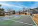 Community basketball court with blue accents and covered picnic area at 230 Leaf Court, Alpharetta, GA 30005