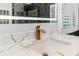 Close-up of the stylish bathroom sink with gold faucet and quartz countertop at 230 Leaf Court, Alpharetta, GA 30005