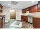 Beautiful kitchen with modern stainless steel appliances and a spacious pantry at 230 Leaf Court, Alpharetta, GA 30005