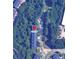 Aerial view of townhome community with mature trees and convenient parking at 4910 Longcourt Se Trce # 13, Atlanta, GA 30339