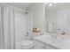 Bathroom featuring a white vanity, toilet, and shower with curtain at 4910 Longcourt Se Trce # 13, Atlanta, GA 30339