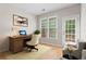 Bright home office with desk, chair, and natural light, perfect for remote work and studying at 4910 Longcourt Se Trce # 13, Atlanta, GA 30339