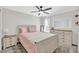 Serene bedroom with dresser, plush carpet, and soft natural light at 516 Broad Head Pt, Suwanee, GA 30024