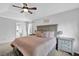 Cozy bedroom with a stylish tray ceiling and neutral walls at 516 Broad Head Pt, Suwanee, GA 30024