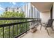 Inviting balcony featuring a city view with potted plants and seating at 1130 Piedmont Ne Ave # 803, Atlanta, GA 30309