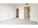 Neutral bedroom with carpet flooring, closet, and bathroom doorway at 1130 Piedmont Ne Ave # 803, Atlanta, GA 30309