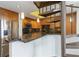 Modern kitchen features granite countertops, stainless steel appliances, and a unique spiral staircase at 1130 Piedmont Ne Ave # 803, Atlanta, GA 30309