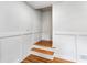 Basement space with finished steps and decorative wainscoting panels at 1150 Rankin St # 6H, Stone Mountain, GA 30083