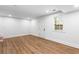 Finished basement space with recessed lighting, wood-look flooring, and ample natural light at 1150 Rankin St # 6H, Stone Mountain, GA 30083
