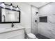 Beautifully updated bathroom featuring a marbled tile shower and modern fixtures at 1150 Rankin St # 6H, Stone Mountain, GA 30083