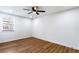 Bright bedroom with modern ceiling fan, window, and attractive flooring at 1150 Rankin St # 6H, Stone Mountain, GA 30083