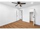 Bright bedroom with closet, ceiling fan, and stylish modern floors at 1150 Rankin St # 6H, Stone Mountain, GA 30083