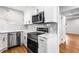 Recently remodeled kitchen featuring stainless steel appliances, subway tile, and modern lighting at 1150 Rankin St # 6H, Stone Mountain, GA 30083