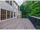 View of the back of the house showing the deck and the abundance of trees at 2695 Rangewood Ne Dr, Atlanta, GA 30345