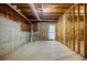 Unfinished basement with exposed beams and concrete foundation at 2695 Rangewood Ne Dr, Atlanta, GA 30345