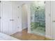 Bathroom featuring a large glass shower with tile surround and tile flooring at 2695 Rangewood Ne Dr, Atlanta, GA 30345