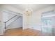 Elegant dining room with hardwood floors, crown molding, and a chandelier, perfect for hosting gatherings at 2695 Rangewood Ne Dr, Atlanta, GA 30345