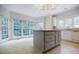 Bright kitchen with stainless steel appliances, large windows, and a spacious center island at 2695 Rangewood Ne Dr, Atlanta, GA 30345
