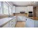 Functional kitchen with ample counter space, white cabinetry, and modern appliances for culinary enthusiasts at 2695 Rangewood Ne Dr, Atlanta, GA 30345