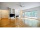 Spacious living room featuring a fireplace, built-in shelving, and large windows that bring in natural light at 2695 Rangewood Ne Dr, Atlanta, GA 30345