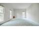 Spacious room with neutral carpeting and large windows, offering natural light at 2695 Rangewood Ne Dr, Atlanta, GA 30345