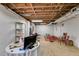 Unfinished basement space ready for your personal touch features an open beam ceiling at 7720 Milam Rd, Winston, GA 30187