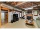 Finished basement featuring a cozy fireplace, entertainment area, and ample living space at 7720 Milam Rd, Winston, GA 30187