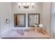 Elegant bathroom featuring dual mirrors, a light-colored vanity, and a modern design at 7720 Milam Rd, Winston, GA 30187
