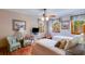 Inviting bedroom with twin beds, ample natural light, and hardwood floors at 7720 Milam Rd, Winston, GA 30187