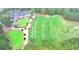 Exclusive property with large home and golf amenities, including a putting green and driving range at 8525 Saint Marlo Fairway Way, Duluth, GA 30097