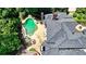 Estate aerial showcases a pool, spa, and outdoor seating in a private, lush setting at 8525 Saint Marlo Fairway Way, Duluth, GA 30097