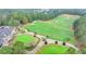 Expansive golf course with lush greens and manicured landscaping provides a scenic view at 8525 Saint Marlo Fairway Way, Duluth, GA 30097