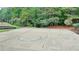 Outdoor basketball court for recreation and sports activities within the community at 8525 Saint Marlo Fairway Way, Duluth, GA 30097