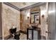 Unique powder room features interesting wall texture and a modern vanity at 8525 Saint Marlo Fairway Way, Duluth, GA 30097