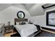 Bedroom featuring a round window, and wood flooring at 8525 Saint Marlo Fairway Way, Duluth, GA 30097