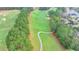 Scenic golf course view featuring lush fairways, mature trees and a winding cart path at 8525 Saint Marlo Fairway Way, Duluth, GA 30097
