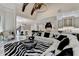 Bright living room with open access to the kitchen and dining area at 8525 Saint Marlo Fairway Way, Duluth, GA 30097