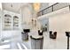 Bright living room with fireplace, custom built-ins, and modern furniture at 8525 Saint Marlo Fairway Way, Duluth, GA 30097