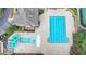 Aerial view of community pool and water park, featuring a lap pool and water slide at 8525 Saint Marlo Fairway Way, Duluth, GA 30097