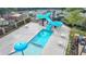 Community water park featuring a pool and slide at 8525 Saint Marlo Fairway Way, Duluth, GA 30097