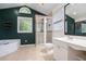 Modern bathroom with tiled floor, glass shower, tub and vanity at 890 Oriole Se Ln, Marietta, GA 30067
