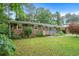 Lovely brick home with a well-maintained lawn and inviting front porch at 890 Oriole Se Ln, Marietta, GA 30067