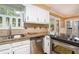 Bright kitchen featuring granite countertops and stainless steel appliances at 890 Oriole Se Ln, Marietta, GA 30067